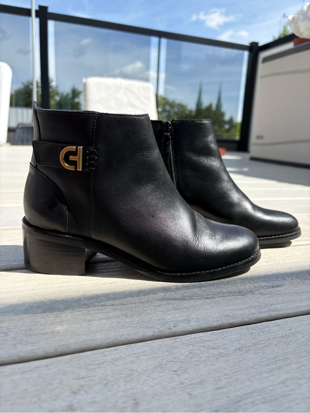 Cole Haan Black Leather Ankle Booties with Gold Accent